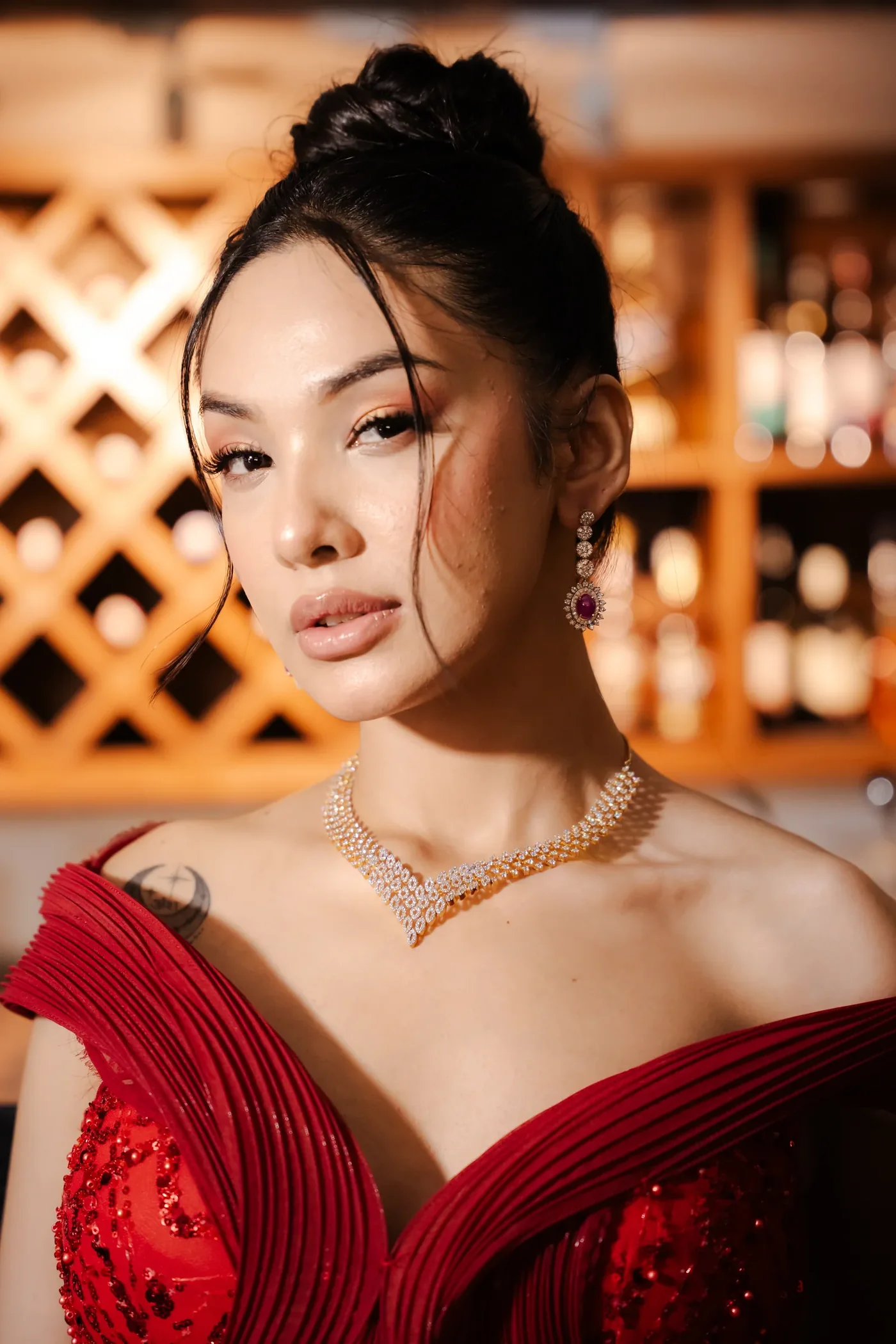 Sanya Adhikari in a red gown